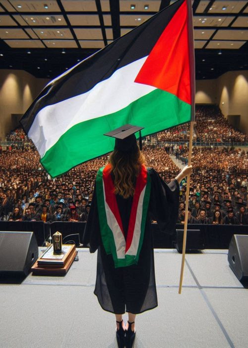 A university student holding a Palestinian flag on her graduation day on stage, with no other flags on the stage or in the audience